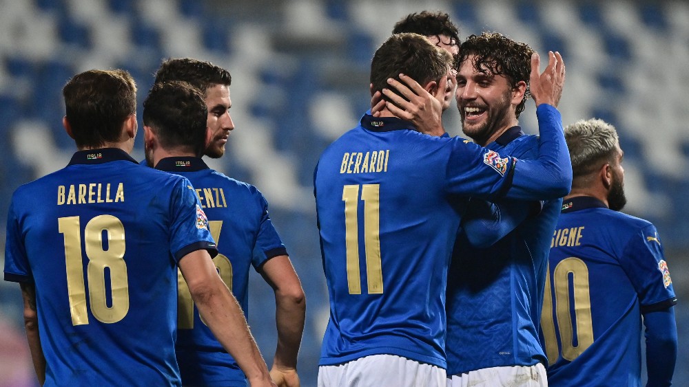 Italy squad celebrating (©AFP)